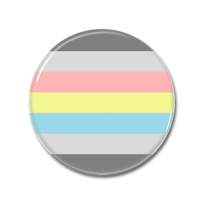 Anstecker mit nicht-binärer Flagge Runder Anstecker mit den Farben der Flagge für nicht-binäre Identität, bestehend aus grau, weiß, hellblau, hellgelb und rosa.