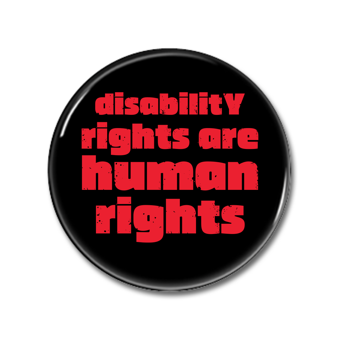 Runde Brosche mit der Aufschrift „disability rights are human rights“ in roten Buchstaben auf schwarzem Hintergrund.